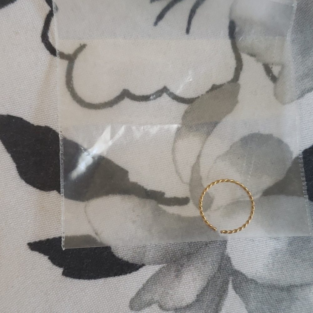 Hoop nose piercing
